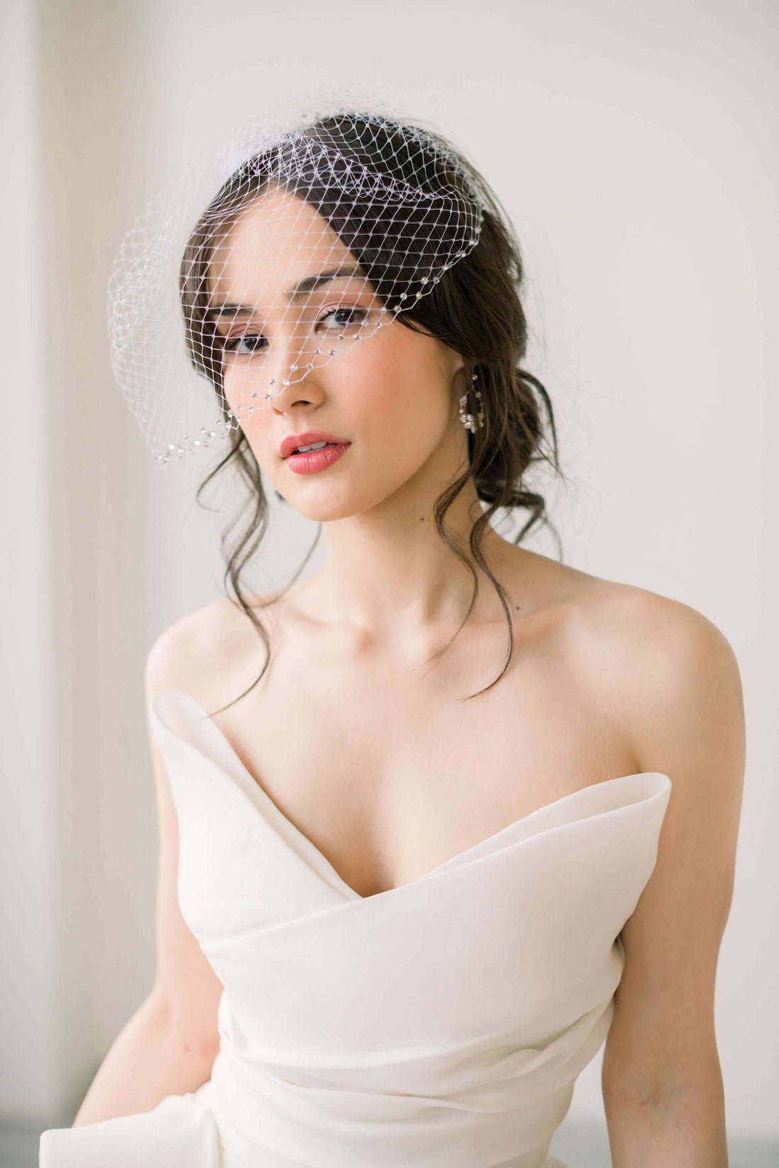 Featured product: Luxe birdcage veil with rhinestone edge Tessa Kim