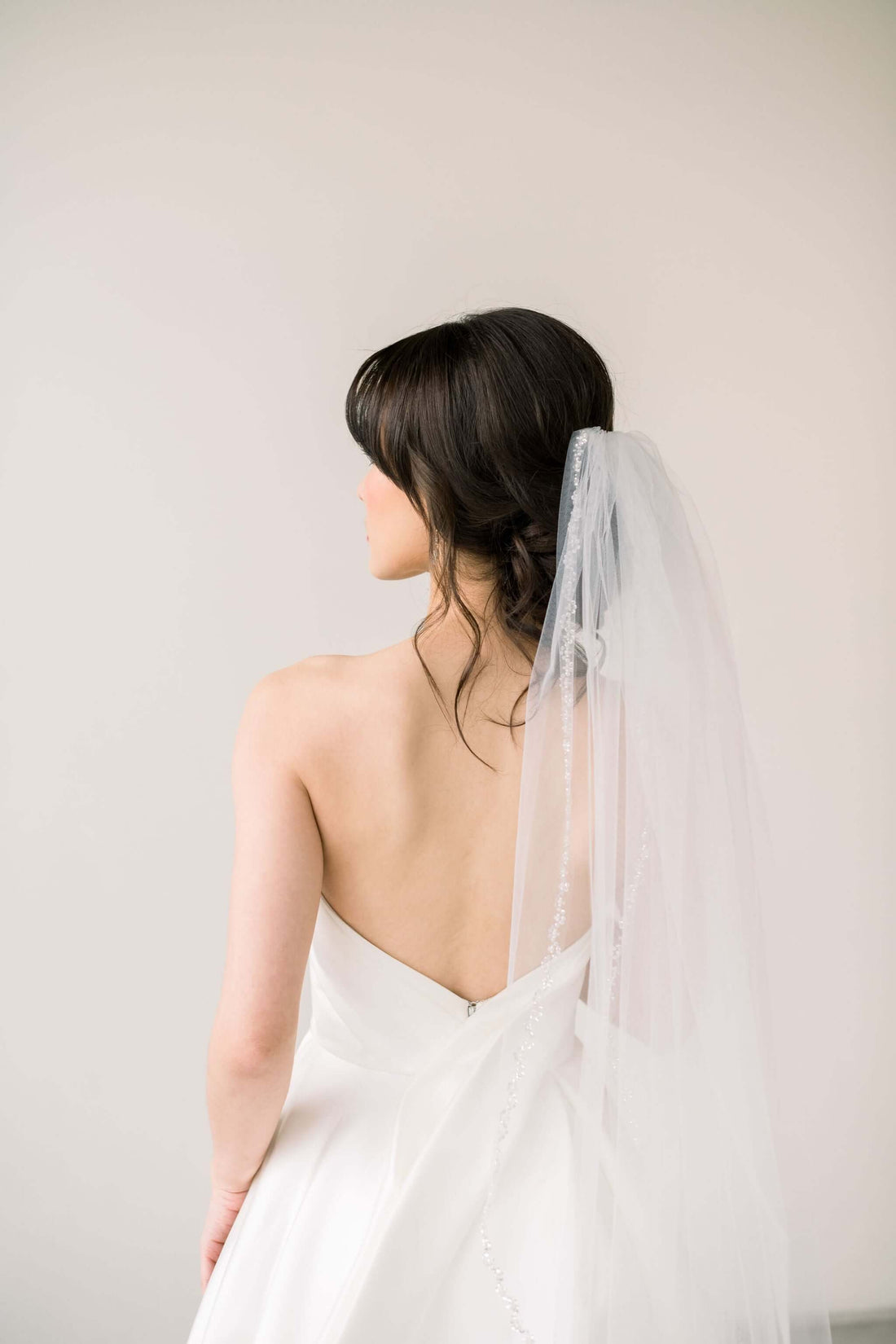 How do you keep a wedding veil comb in place? Tessa Kim